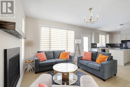 258 Sapling Grove, Ottawa, ON - Indoor Photo Showing Living Room With Fireplace