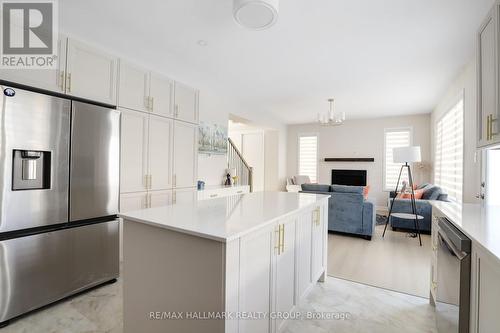 258 Sapling Grove, Ottawa, ON - Indoor Photo Showing Kitchen With Fireplace With Upgraded Kitchen