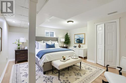 Basement bedroom - Virtually Staged - 6 Robina Avenue, Ottawa, ON - Indoor Photo Showing Bedroom