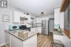 kitchen w/ stainless steel appliances/gas-stove - 