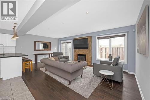 23 Bellflower Boulevard, Hamilton, ON - Indoor Photo Showing Living Room With Fireplace