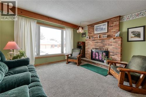249 Macdonald Drive, Woodstock, ON - Indoor Photo Showing Living Room With Fireplace