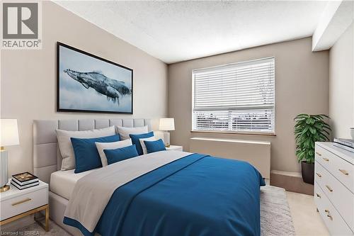 2nd bedroom.  Virtually staged. - 88 Tollgate Road Unit# 402, Brantford, ON - Indoor Photo Showing Bedroom