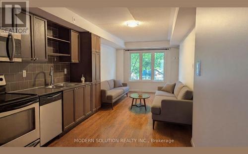 LIVING-ROOM - 3 - 70 Munro Street, Toronto, ON - Indoor Photo Showing Kitchen