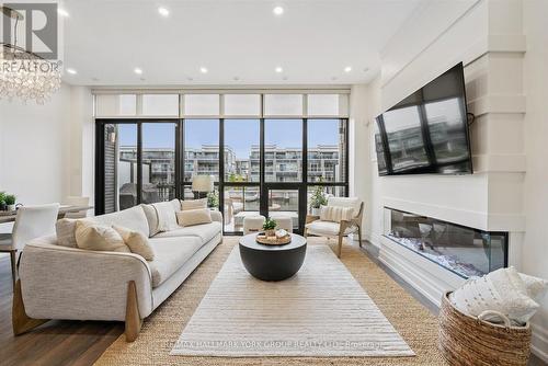 3753 Riva Avenue, Innisfil, ON - Indoor Photo Showing Living Room With Fireplace