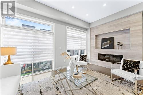 131 Lebovic Campus Drive, Vaughan, ON - Indoor Photo Showing Living Room With Fireplace