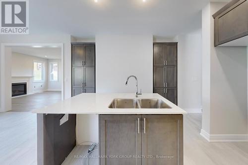 2966 Monarch Drive, Orillia, ON - Indoor Photo Showing Kitchen With Fireplace