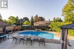 4 Pool Loungers Included - 