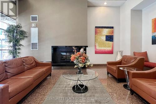 703 - 736 Bay Street, Toronto, ON - Indoor Photo Showing Living Room With Fireplace