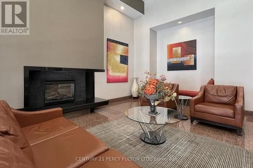 703 - 736 Bay Street, Toronto, ON - Indoor Photo Showing Living Room With Fireplace