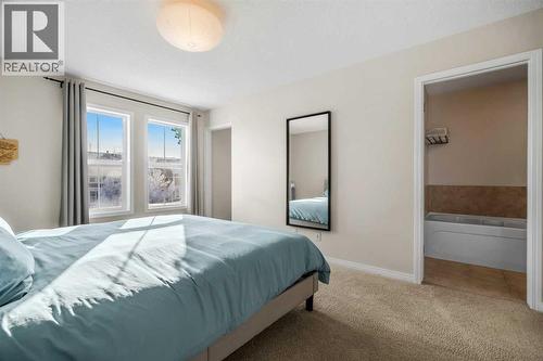 32 Auburn Bay Boulevard Se, Calgary, AB - Indoor Photo Showing Bedroom