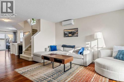 32 Auburn Bay Boulevard Se, Calgary, AB - Indoor Photo Showing Living Room
