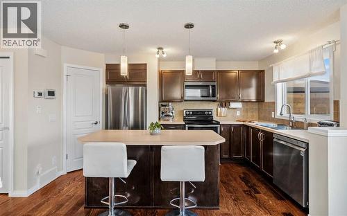 32 Auburn Bay Boulevard Se, Calgary, AB - Indoor Photo Showing Kitchen With Double Sink With Upgraded Kitchen