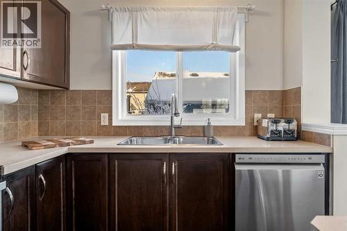 32 Auburn Bay Boulevard Se, Calgary, AB - Indoor Photo Showing Kitchen With Double Sink