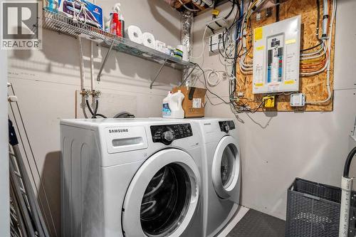32 Auburn Bay Boulevard Se, Calgary, AB - Indoor Photo Showing Laundry Room