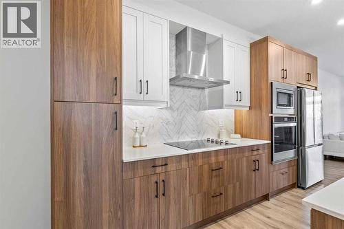 112, 40 Walgrove Walk Se, Calgary, AB - Indoor Photo Showing Kitchen With Upgraded Kitchen