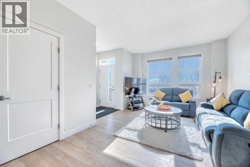 196 Wolf Hollow Park Se, Calgary, AB - Indoor Photo Showing Living Room