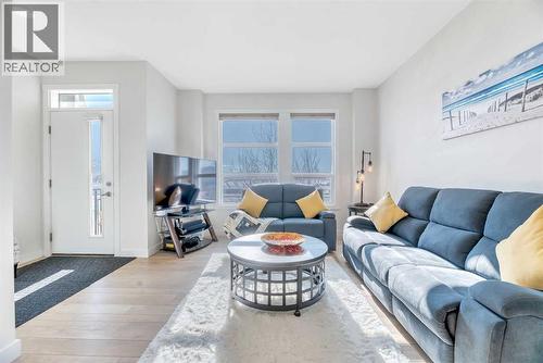 196 Wolf Hollow Park Se, Calgary, AB - Indoor Photo Showing Living Room