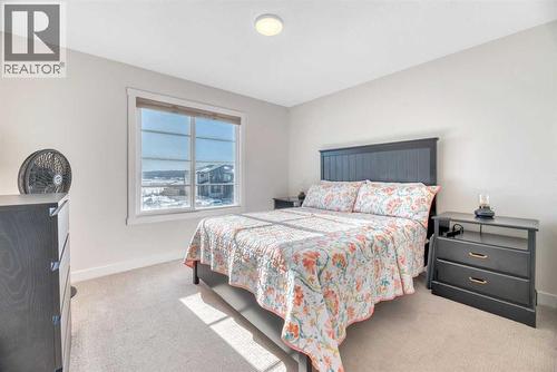 Primary Bedroom - 196 Wolf Hollow Park Se, Calgary, AB - Indoor Photo Showing Bedroom