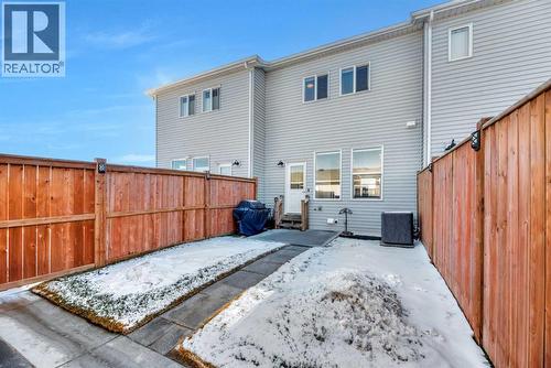 Fenced and Landscaped - 196 Wolf Hollow Park Se, Calgary, AB - Outdoor With Exterior