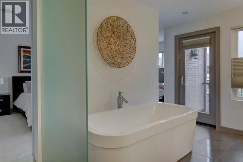 access to bedroom balcony - 416 Aspen Meadows Hill Sw, Calgary, AB - Indoor Photo Showing Bathroom