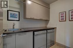 2nd level laundry with storage and sink - 