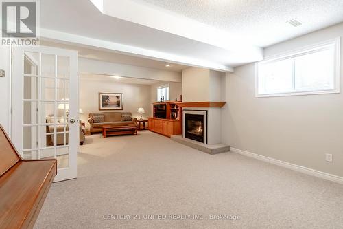 2451 Denure Drive, Peterborough (Monaghan Ward 2), ON - Indoor With Fireplace