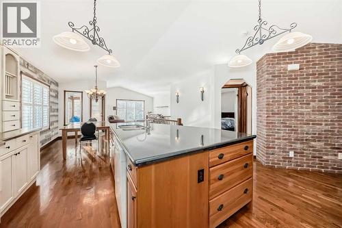 5647 55 Avenuecrescent, Innisfail, AB - Indoor Photo Showing Kitchen With Double Sink