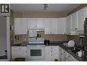 2951 11 Avenue Ne Unit# 10, Salmon Arm, BC  - Indoor Photo Showing Kitchen With Double Sink 