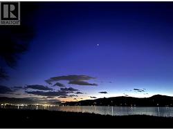 Night view across Swan Lake - 