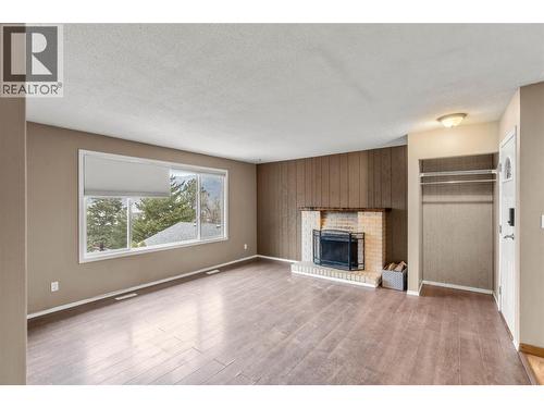 1253 Highridge Drive, Kamloops, BC - Indoor Photo Showing Living Room With Fireplace