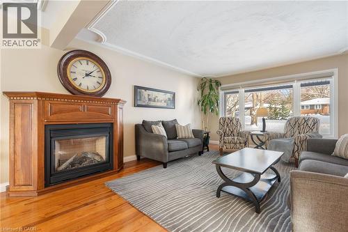 39 Sunset Drive, Simcoe, ON - Indoor Photo Showing Living Room With Fireplace