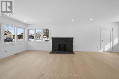 124 Corman Avenue, Hamilton, ON - Indoor Photo Showing Living Room With Fireplace