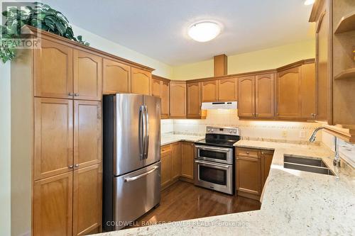 5 - 2295 Kains Road, London South (South A), ON - Indoor Photo Showing Kitchen With Double Sink