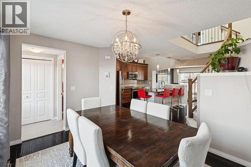 15 New Brighton Common Se, Calgary, AB - Indoor Photo Showing Dining Room