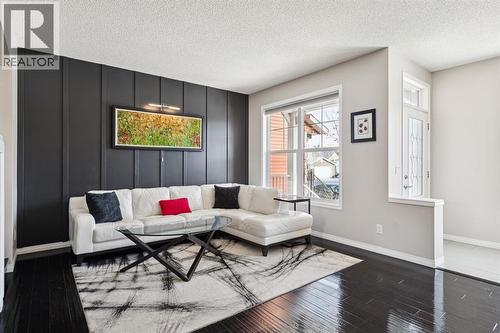 15 New Brighton Common Se, Calgary, AB - Indoor Photo Showing Living Room