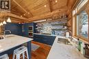 1783 Greywolf Drive, Panorama, BC  - Indoor Photo Showing Kitchen With Fireplace 