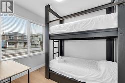 Main Floor Bedroom. Photos are from Previous Listing - 