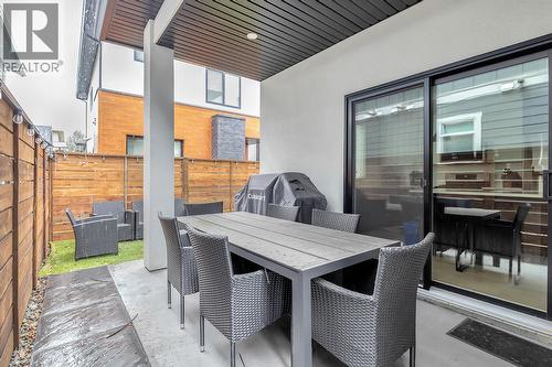 Patio. Photos are from Previous Listing - 1927 Ethel Street, Kelowna, BC - Outdoor With Deck Patio Veranda With Exterior