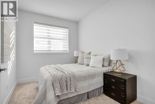 Photos are of a similar home in the community. - 5300 Main Street Unit# 115, Kelowna, BC - Indoor Photo Showing Bedroom