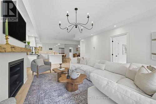 17 Mill Street, East Gwillimbury, ON - Indoor Photo Showing Living Room With Fireplace
