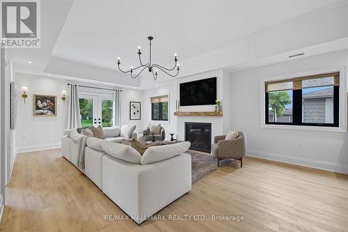 17 Mill Street, East Gwillimbury, ON - Indoor Photo Showing Living Room With Fireplace