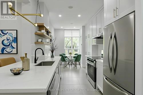 103 - 130 Pond Drive, Markham, ON - Indoor Photo Showing Kitchen With Upgraded Kitchen