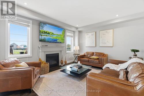 28 Celano Drive, Hamilton, ON - Indoor Photo Showing Living Room With Fireplace