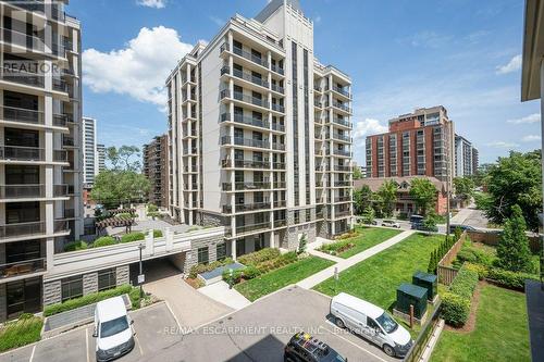 302 - 90 Charlton Avenue W, Hamilton, ON - Outdoor With Balcony With Facade