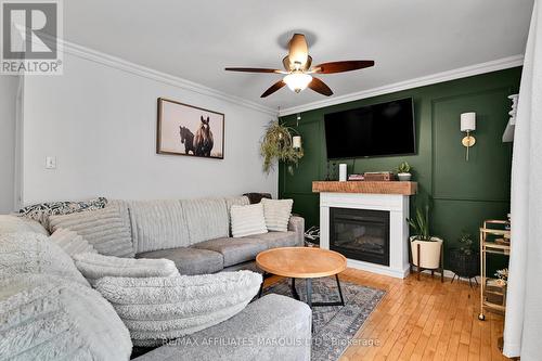 3200 Bruce Street, South Stormont, ON - Indoor Photo Showing Living Room With Fireplace