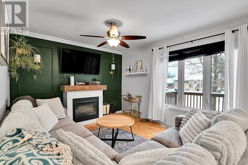 3200 Bruce Street, South Stormont, ON - Indoor Photo Showing Living Room With Fireplace