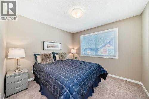 236 New Brighton Row Se, Calgary, AB - Indoor Photo Showing Bedroom