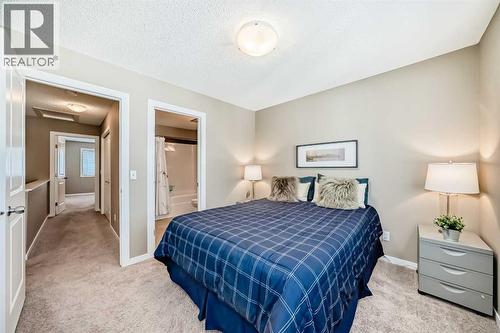 236 New Brighton Row Se, Calgary, AB - Indoor Photo Showing Bedroom