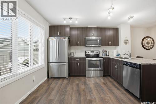 7904 Canola Avenue, Regina, SK - Indoor Photo Showing Kitchen With Double Sink